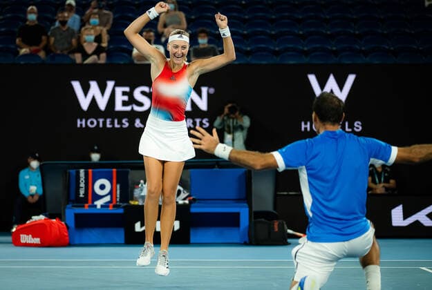 January 28, 2022, MELBOURNE, AUSTRALIA: Kristina Mladenovic of France in action during the mixed doubles final with partner Ivan Dodig at the 2022 Australian Open Grand Slam Tennis Tournament MELBOURNE AUSTRALIA - ZUMAa181 20220128_zaa_a181_014 Copyright: xRobxPrangex