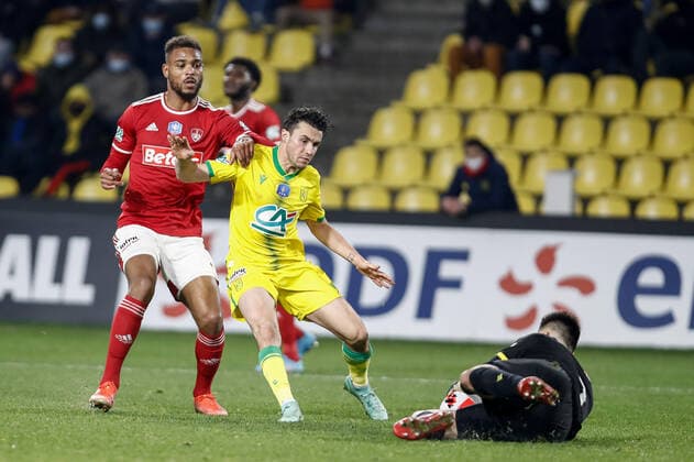 Mounie Steve (Stade Brestois) vs Sebastien Corchia (Nantes) FOOTBALL : 8e finale de la Coupe de France - FC Nantes vs Stade Brestois - 28 01 2022 AurelienMorissard Panoramic 