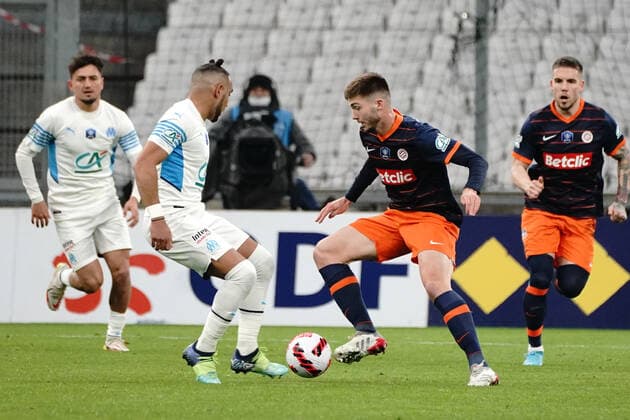 Leo Leroy (Montpellier FC) - Dimitri Payet (Olympique de Marseille) FOOTBALL : Olympique de Marseille vs Montpellier - de 8 eme de finale Coupe de France - Marseille - 29 02 2022 NorbertScanella Panoramic 