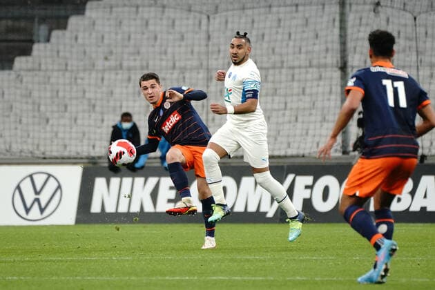 Joris Chotard (Montpellier) - Dimitri Payet (Olympique de Marseille) FOOTBALL : Olympique de Marseille vs Montpellier - de 8 eme de finale Coupe de France - Marseille - 29 02 2022 NorbertScanella Panoramic 
