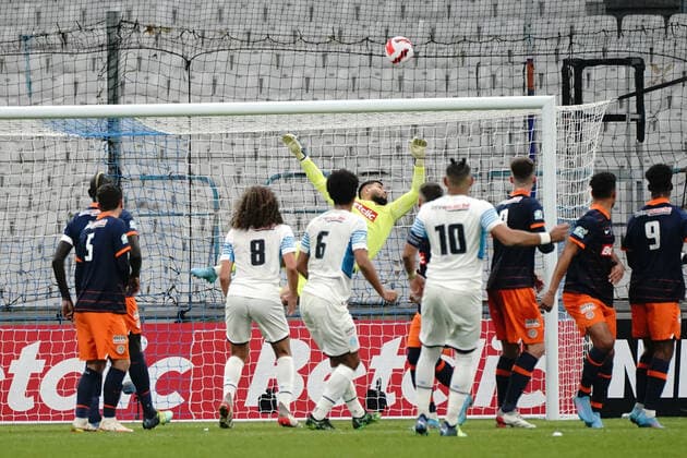 Dimitry Bertaud (Montpellier FC) - Dimitri Payet (Olympique de Marseille) FOOTBALL : Olympique de Marseille vs Montpellier - de 8 eme de finale Coupe de France - Marseille - 29 02 2022 NorbertScanella Panoramic 