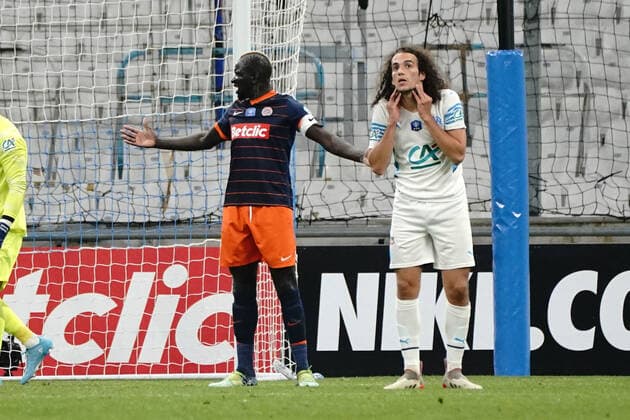 Matteo Guendouzi (Olympique de Marseille) - Mamadou Sakho (Montpellier FC) FOOTBALL : Olympique de Marseille vs Montpellier - de 8 eme de finale Coupe de France - Marseille - 29 02 2022 NorbertScanella Panoramic 
