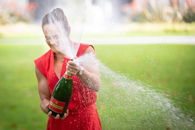 Mandatory Credit: Photo by James Gourley Shutterstock (12778011n) Ashleigh Barty celebrates with Champagne Australian Open, Day Fourteen, Tennis, Melbourne Park, Melbourne, Australia - 30 Jan 2022 Australian Open, Day Fourteen, Tennis, Melbourne Park, Melbourne, Australia - 30 Jan 2022 Copyright: xJamesxGourley Shutterstockx 12778011n