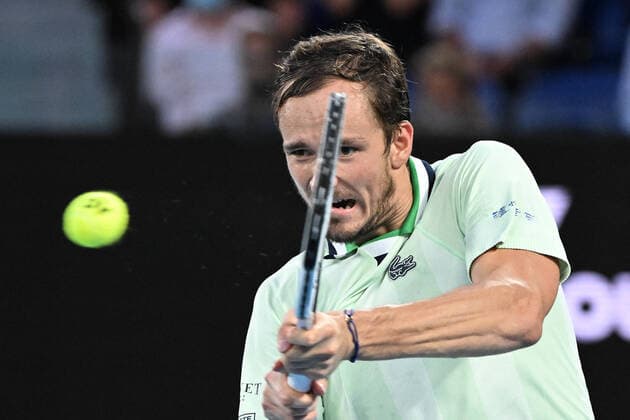 TENNIS AUSTRALIAN OPEN, Russia?s Daniil Medvedev plays a shot during the men?s singles final with Spain?s Rafael Nadal on Day 14 of the Australian Open at Melbourne Park in Melbourne, Sunday, January 30, 2022. ( NO ARCHIVING, EDITORIAL USE ONLY, NO USE IN BOOKS WITHOUT CONSENT MELBOURNE VIC AUSTRALIA  Copyright: xDAVExHUNTx 20220130001618405029