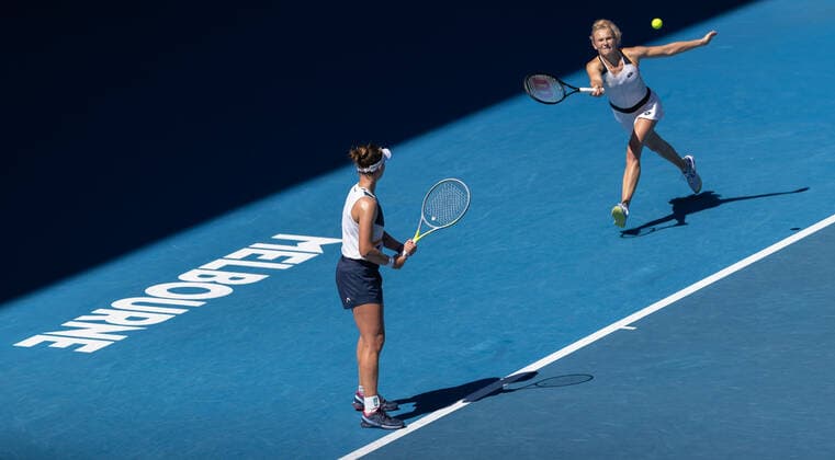 (220130) -- MELBOURNE, Jan. 30, 2022 -- Barbora Krejcikova (L) Katerina Siniakova of the Czech Republic compete during the women s doubles final match against Anna Danilina of Kazakhstan Beatriz Haddad Maia of Brazil at Australian Open in Melbourne, Australia, on Jan. 30, 2022. (Photo by Xinhua) (SP)AUSTRALIA-MELBOURNE-TENNIS-AUSTRALIAN OPEN-WOMEN S DOUBLES-FINAL HuxJingchen 