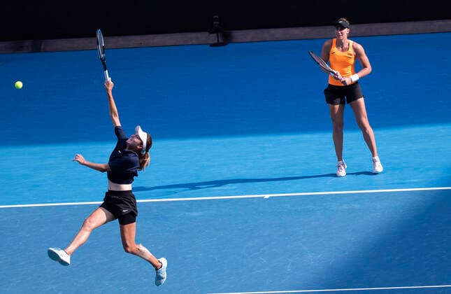 (220130) -- MELBOURNE, Jan. 30, 2022 -- Anna Danilina (L) of Kazakhstan Beatriz Haddad Maia of Brazil compete during the women s doubles final match against Barbora Krejcikova Katerina Siniakova of the Czech Republic at Australian Open in Melbourne, Australia, on Jan. 30, 2022. ) (SP)AUSTRALIA-MELBOURNE-TENNIS-AUSTRALIAN OPEN-WOMEN S DOUBLES-FINAL BaixXuefei 
