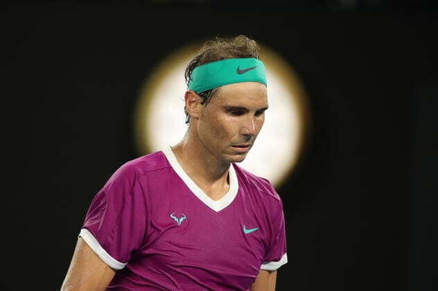 (220130) -- MELBOURNE, Jan. 30, 2022 -- Rafael Nadal of Spain reacts during the men s singles final match between Rafael Nadal of Spain and Daniil Medvedev of Russia at Australian Open in Melbourne Park, in Melbourne, Australia, on Jan. 30, 2022. ) (SP)AUSTRALIA-MELBOURNE-TENNIS-AUSTRALIAN OPEN-MEN S SINGLES-FINALS BaixXuefei 