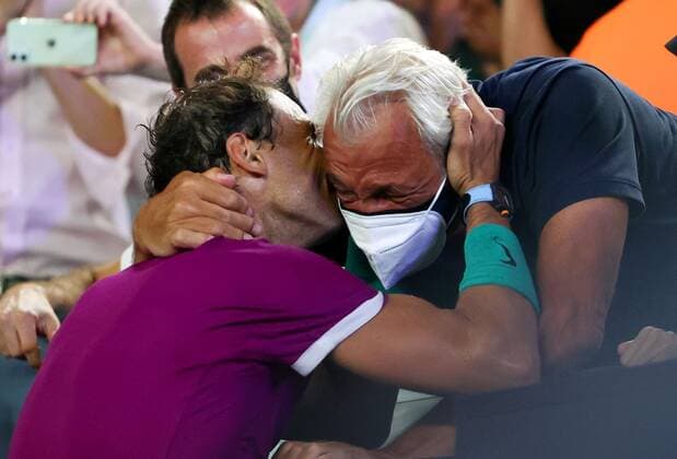 Mandatory Credit: Photo by Ella Ling Shutterstock (12778014fi) Rafael Nadal celebrates victory in the Men s Singles final with his father, Sebastian Nadal Australian Open, Day Fourteen, Tennis, Melbourne Park, Melbourne, Australia - 30 Jan 2022 Australian Open, Day Fourteen, Tennis, Melbourne Park, Melbourne, Australia - 30 Jan 2022 Copyright: xEllaxLing Shutterstockx 12778014fi