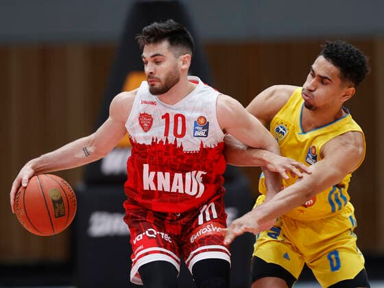 30.01.2022, Basketball, BBL, Hauptrunde, s.Oliver Wuerzburg - Alba Berlin, GER, Wuerzburg, tectake-Arena Bild v, li.: Luciano Parodi (s.Oliver Wuerzburg) und Maodo Lo (ALBA BERLIN) Copyright: HMBxMedia xHeikoxBecker
