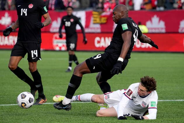 January 30, 2022, Hamilton, ON, CANADA: United States Brendan Aaronson (11) picks up a foul for a tackle on Canada s Kamal Miller (4) during first half World Cup qualifying soccer action in Hamilton, Ont., Sunday, Jan. 30, 2022. Canada News - January 30, 2022  - ZUMAc35_ 20220130_zaf_c35_052 Copyright: xFrankxGunnx