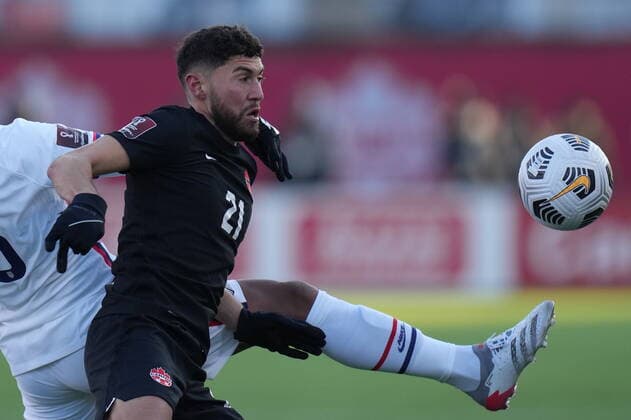 January 30, 2022, Hamilton, ON, CANADA: Canada s Jonathan Osorio, 21, battles USA s Weston McKennie for the ball during second half men s World Cup Qualifier at sold out Tim Hortons Field in Hamilton, Ontario Sunday Jan. 30, 2022. Canada News - January 30, 2022  - ZUMAc35_ 20220130_zaf_c35_067 Copyright: xNathanxDenettex