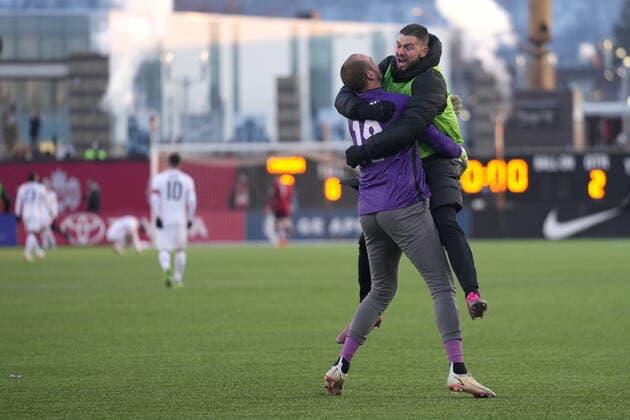 January 30, 2022, Hamilton, ON, CANADA: Canada keeper Milan Borjan, 18, celebrates with a teammate after defeating the USA 2-0 in men s World Cup Qualifier at sold out Tim Hortons Field in Hamilton, Ontario Sunday Jan. 30, 2022. Canada News - January 30, 2022  - ZUMAc35_ 20220130_zaf_c35_097 Copyright: xNathanxDenettex