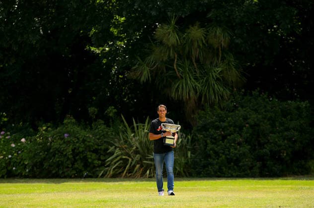 Mandatory Credit: Photo by Ella Ling Shutterstock (12778015ad) Rafael Nadal of Spain smiles with the trophy at Government House for a photo shoot Australian Open, Tennis, Melbourne Park, Melbourne, Australia - 31 Jan 2022 Australian Open, Tennis, Melbourne Park, Melbourne, Australia - 31 Jan 2022  Copyright: xEllaxLing Shutterstockx 12778015ad