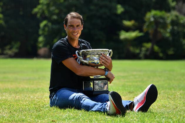 RAFAEL NADAL AUSTRALIAN OPEN 2022, Rafael Nadal of Spain poses for a photograph with the Norman Brookes Challenge Cup in Melbourne, Monday, January 31, 2022. Nadal won a record 21st Grand Slam and his second Australian Open title on Sunday after a thrilling five set victory over Daniil Medvedev of Russia. ( NO ARCHIVING, EDITORIAL USE ONLY, NO USE IN BOOKS WITHOUT CONSENT MELBOURNE VICTORIA AUSTRALIA  Copyright: xJOELxCARRETTx 20220131001618648364
