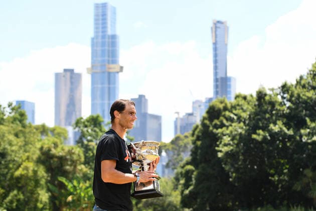 (220131) -- MELBOURNE, Jan. 31, 2022 -- Rafael Nadal of Spain poses with his trophy of Australian Open at Government House in Melbourne, Australia, Jan. 31, 2022. (Photo by Xinhua) (SP)AUSTRALIA-MELBOURNE-TENNIS-AUSTRALIAN OPEN-NADAL-TROPHY BaixXue 