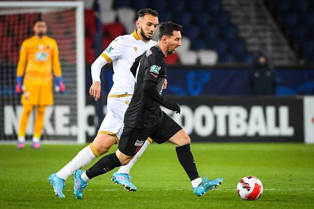 January 31, 2022, Paris, France, France: Amine GOUIRI of Nice and Lionel (Leo) MESSI of PSG during the French Cup match between Paris Saint-Germain (PSG) and OGC Nice at Parc des Princes stadium on January 31, 2022 in Paris, France. Paris France - ZUMAm308 20220131_zsp_m308_001 Copyright: xMatthieuxMirvillex