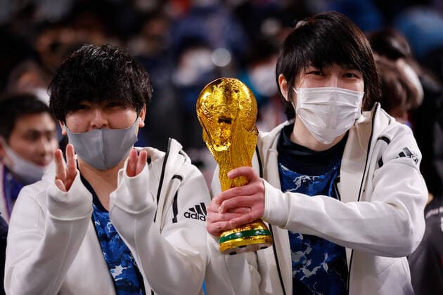 February 1, 2022, Saitama, Japan: Japanese fans wearing face masks pose for a picture duringÃ‚ an AFC Asian Qualifiers (Road to Qatar) Japan vs Saudi Arabia at Saitama Stadium 2002 in Japan. Japan defeats Saudi Arabia 2-0. Saitama Japan - ZUMAm191 20220201_zap_m191_029 Copyright: xRodrigoxReyesxMarinx