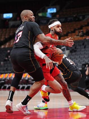 February 1, 2022, TORONTO, ON, CANADA: Toronto Raptors guard Gary Trent Jr. (33) drives past Miami Heat forward P.J. Tucker (17) during first half NBA, Basketball Herren, USA basketball action in Toronto on Tuesday, February 1, 2022. Canada News - February 1, 2022  - ZUMAc35_ 20220201_zaf_c35_087 Copyright: xNathanxDenettex