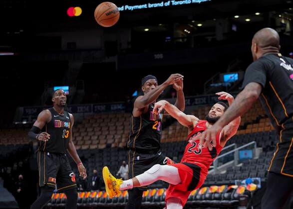February 1, 2022, TORONTO, ON, CANADA: Toronto Raptors guard Fred VanVleet (23) moves the ball past Miami Heat forward Jimmy Butler (22) during first half NBA, Basketball Herren, USA basketball action in Toronto on Tuesday, February 1, 2022. Canada News - February 1, 2022  - ZUMAc35_ 20220201_zaf_c35_100 Copyright: xNathanxDenettex