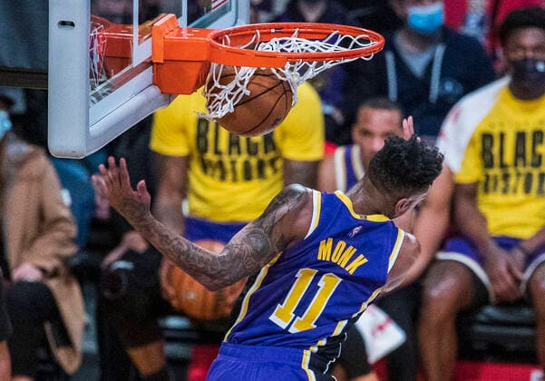 February 2, 2022, Los Angeles, California, USA: Malik Monk 11 of the Los Angeles Lakers dunks the ball during their NBA, Basketball Herren, USA game against the Portland Trailblazers on Wednesday February 2, 2022 at Crypto.com Arena in Los Angeles, California. PI Los Angeles USA - ZUMAp124 20220202_zaa_p124_012 Copyright: xJAVIERxROJASx