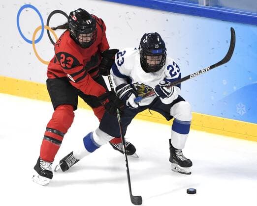 Sanni Hakala of Finland and Erin Ambrose of Canada during women s Ice hockey, Eishockey preliminary round group A match between Finland and Canada at the Beijing Winter Olympic Games, Olympische Spiele, Olympia, OS in Wukesong Sports Centre in Beijing on February 5, 2022. Beijing China LKLAPJ20220205063814Q315  Copyright: xJussixNukarix