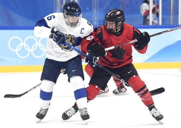 Jenni Hiirikoski of Finland and Jill Saulnier of Canada during women s Ice hockey, Eishockey preliminary round group A match between Finland and Canada at the Beijing Winter Olympic Games, Olympische Spiele, Olympia, OS in Wukesong Sports Centre in Beijing on February 5, 2022. Beijing China LKLAPJ20220205081949D670  Copyright: xJussixNukarix