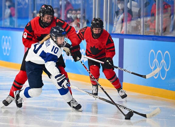 (220205) -- BEIJING, Feb. 5, 2022 -- Elisa Holopainen (front) of Finland vies with Laura Stacey (L) of Canada during the Ice hockey, Eishockey women s preliminary round group A match between Canada and Finland at Wukesong Sports Centre in Beijing, capital of China, Feb. 5, 2022. ) (BEIJING2022)CHINA-BEIJING-OLYMPIC Winter games, Winterspiele,Spiele, Summer games ICE HOCKEY-WOMEN S PRELIMINARY-CANADA VS FINLAND SongxYanhua 