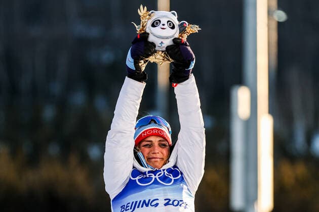 ZHANGJIAKOU, CHINA â€“ FEBRUARY 5, 2022: First-placed cross-country skier Therese Johaug of Norway poses at a flower ceremony for the women s 7.5km + 7.5km skiathlon race during the Beijing 2022 Winter Olympic Games, Olympische Spiele, Olympia, OS at the National Cross-Country Skiing Centre. Sergei Bobylev TASS  TS121658