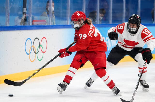 BEIJING, CHINA - FEBRUARY 7, 2022: Landysh Falyakhova (L) of the ROC Team and Brianne Jenner of Canada fight for the puck in their women s Group A Ice hockey, Eishockey match at the 2022 Winter Olympic Games, Olympische Spiele, Olympia, OS at the Wukesong Sports Centre. Anton Novoderezhkin TASS  TS121ADF