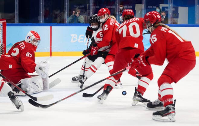BEIJING, CHINA - FEBRUARY 7, 2022: Goalie Daria Gredzen of the ROC Team, Rebecca Johnston of Canada, Maria Pechnikova, Anna Shibanova and Valeria Pavlova (L-R) of the ROC Team are in action in their women s Group A Ice hockey, Eishockey match at the 2022 Winter Olympic Games, Olympische Spiele, Olympia, OS at the Wukesong Sports Centre. Anton Novoderezhkin TASS  TS121B0A