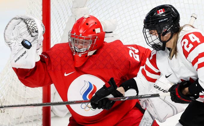 BEIJING, CHINA - FEBRUARY 7, 2022: Goalie Daria Gredzen (L) of the ROC Team and Natalie Spooner of Canada are in action in their women s Group A Ice hockey, Eishockey match at the 2022 Winter Olympic Games, Olympische Spiele, Olympia, OS at the Wukesong Sports Centre. Anton Novoderezhkin TASS  TS121B21