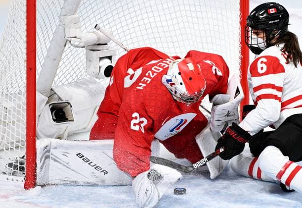 China Olympics 2022 Ice hockey, Eishockey Women ROC - Canada 8106740 07.02.2022 Canada s Rebecca Johnston, right, tries to score in the ice hockey women s preliminary round group A match between the Russian Olympic Committee s team and Canada during the Beijing 2022 Winter Olympic Games, Olympische Spiele, Olympia, OS at Wukesong Sports Centre in Beijing, China. Russian Olympic Committee s goaltender Daria Gredzen, is at left. Vladimir Astapkovich Sputnik Beijing China  Copyright: xVladimirxAstapkovichx