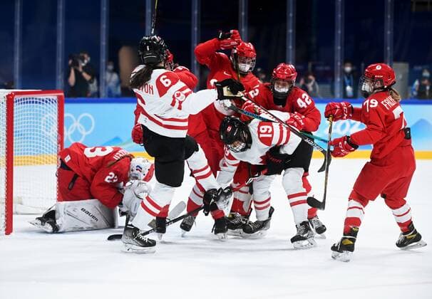 China Olympics 2022 Ice hockey, Eishockey Women ROC - Canada 8106726 07.02.2022 Players struggle for a puck in the ice hockey women s preliminary round group A match between the Russian Olympic Committee s team and Canada during the Beijing 2022 Winter Olympic Games, Olympische Spiele, Olympia, OS at Wukesong Sports Centre in Beijing, China. Vladimir Astapkovich Sputnik Beijing China  Copyright: xVladimirxAstapkovichx