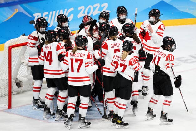BEIJING, CHINA - FEBRUARY 7, 2022: Players of Canada celebrate victory in a women s Group A Ice hockey, Eishockey match against the ROC Team at the 2022 Winter Olympic Games, Olympische Spiele, Olympia, OS at the Wukesong Sports Centre. Anton Novoderezhkin TASS  TS121B5B