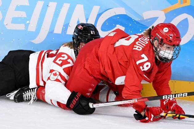 China Olympics 2022 Ice hockey, Eishockey Women ROC - Canada 8106818 07.02.2022 Russian Olympic Committee s Landysh Falyakhova and Canada s Emma Maltais struggle for a puck in the ice hockey women s preliminary round group A match between the Russian Olympic Committee s team and Canada during the Beijing 2022 Winter Olympic Games, Olympische Spiele, Olympia, OS at Wukesong Sports Centre in Beijing, China. Vladimir Astapkovich Sputnik Beijing China  Copyright: xVladimirxAstapkovichx