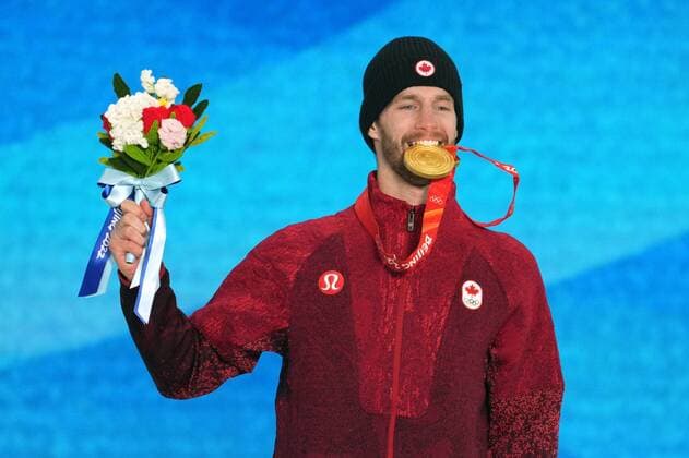 China Olympics 2022 Medal Ceremony 8107020 07.02.2022 Gold medallist Canada s Max Parrot celebrates on the podium during the medal ceremony for the men s snowboard slopestyle event of the Beijing 2022 Winter Olympic Games, Olympische Spiele, Olympia, OS at the Medals Plaza in Zhangjiakou, China. Pavel Bednyakov Sputnik Zhangjiakou China  Copyright: xPavelxBednyakovx