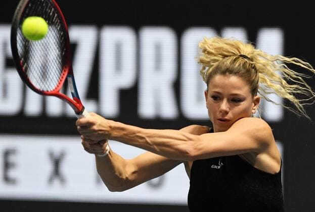 Russia Tennis St. Petersburg Ladies Trophy 8107127 07.02.2022 Italy s Camila Giorgi returns a ball during a women s singles match against Russia s Ekaterina Alexandrova at the St. Petersburg Ladies Trophy 2022 tennis tournament in St.Petersburg, Russia. Alexei Danichev Sputnik St. Petersburg Russia  Copyright: xAlexeixDanichevx
