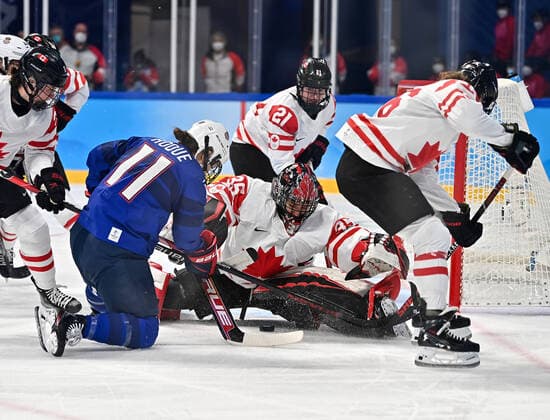 (220208) -- BEIJING, Feb. 8, 2022 -- Goalkeeper Ann-Renee Desbiens (C) of Canada makes a save during the Ice hockey, Eishockey women s preliminary round group A match between Canada and the United States at Wukesong Sports Centre in Beijing, capital of China, Feb. 8, 2022. ) (XHTP)(BEIJING2022)CHINA-BEIJING-OLYMPIC Winter games, Winterspiele,Spiele, Summer games ICE HOCKEY-WOMEN S PRELIMINARY-CANADA VS U.S. (CN) SongxYanhua 
