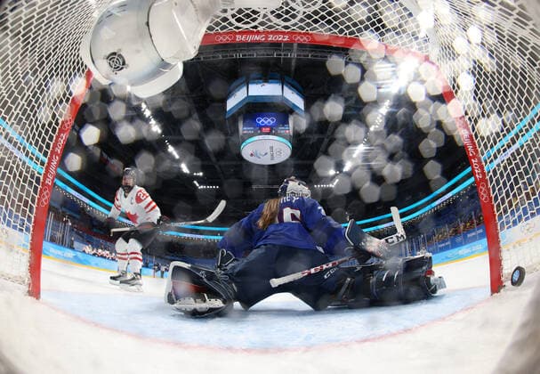 (220208) -- BEIJING, Feb. 8, 2022 -- Marie-Philip Poulin (1st L) of Canada shoots during the Ice hockey, Eishockey women s preliminary round group A match between Canada and the United States at Wukesong Sports Centre in Beijing, capital of China, Feb. 8, 2022. Song Yanhua) (BEIJING2022)CHINA-BEIJING-OLYMPIC Winter games, Winterspiele,Spiele, Summer games ICE HOCKEY-WOMEN S PRELIMINARY-CANADA VS U.S. (CN) RemotexCamera 