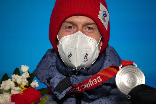 China Olympics 2022 Medal Ceremony 8108125 08.02.2022 Silver medalist Russian Olympic Committee s Evgeniy Klimov poses on the podium during the medal ceremony for the Ski jumping, Skispringen, Ski, nordisch mixed team event of the Beijing 2022 Winter Olympic Games, Olympische Spiele, Olympia, OS at the Medals Plaza in Zhangjiakou, China. Ramil Sitdikov Sputnik Beijing China  Copyright: xRamilxSitdikovx