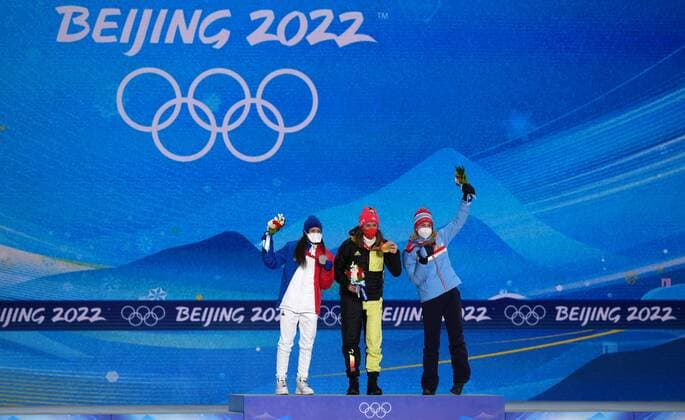 China Olympics 2022 Medal Ceremony 8108195 08.02.2022 Silver medalist France s Anais Chevalier, gold medalist Germany s Denise Herrmann and bronze medalist Norway s Marte Olsbu Roeiseland pose on the podium during the medal ceremony for the biathlon women s 15km individual event of the Beijing 2022 Winter Olympic Games, Olympische Spiele, Olympia, OS at the Medals Plaza in Zhangjiakou, China. Ramil Sitdikov Sputnik Beijing China  Copyright: xRamilxSitdikovx