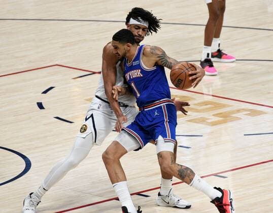 New York Knicks forward Obi Toppin 1, right, fights off Denver Nuggets forward Zeke Nnaji 22, left, during the first quarter at the Ball Arena in Denver, CO, USA, 08 February 2022. EPA Todd Pierson Denver Nuggets - New York Knicks !ACHTUNG: NUR REDAKTIONELLE NUTZUNG!  Copyright: xToddxPiersonx AME4556 20220209-c89e4eeb21b08a9c36f034792c5bb8d7e3d70106