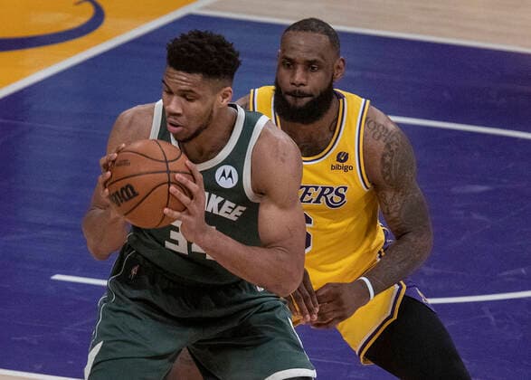 February 8, 2022, Los Angeles, California, USA: LeBron James 6 of the Los Angeles Lakers defends against Giannis Antetokounmpo 34 of the Milwaukee Bucks during their NBA, Basketball Herren, USA game on Tuesday February 8, 2022 at Crypto.com Arena in Los Angeles, California. Lakers lose to Bucks, 116-131. PI Los Angeles USA - ZUMAp124 20220208_zaa_p124_047 Copyright: xJAVIERxROJASx