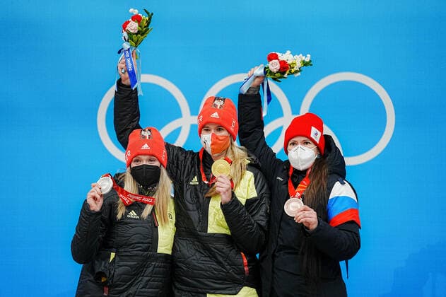 (220208) -- BEIJING, Feb. 8, 2022 -- Gold medallist Germany s Natalie Geisenberger (C), Silver medallist Germany s Anna Berreiter (L) and Bronze medallist ROC s Tatyana Ivanova attend the awarding ceremony after women s singles run?of luge event?at the Yanqing?National Sliding Centre in Yanqing?district of Beijing, capital of China, Feb. 8, 2022. ) (BEIJING2022)CHINA-BEIJING-YANQING-OLYMPIC Winter games, Winterspiele,Spiele, Summer games LUGE-WOMEN S SINGLES (CN) JiangxWenyao 