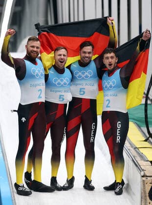 BEIJING, CHINA - FEBRUARY 9, 2022: Gold medalists Tobias Wendl (2nd R) and Tobias Arlt (2nd L), silver medalists Toni Eggert (L) and Sascha Benecken (R) of Germany pose for a photo after a men s luge doubles run at the 2022 Winter Olympic Games, Olympische Spiele, Olympia, OS at the Yanqing National Sliding Centre. Anton Novoderezhkin TASS  TS122212