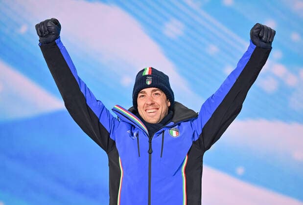 (220209) -- ZHANGJIAKOU, Feb. 9, 2022 -- Silver medalist Federico Pellegrino of Italy reacts during the awarding ceremony of men s cross-country skiing sprint free at Zhangjiakou Medals Plaza of the Winter Olympics in Zhangjiakou, north China s Hebei Province, Feb. 9, 2022. ) (BEIJING2022)CHINA- ZHANGJIAKOU-OLYMPIC Winter games, Winterspiele,Spiele, Summer games AWARDING CEREMONY (CN) GuoxCheng 