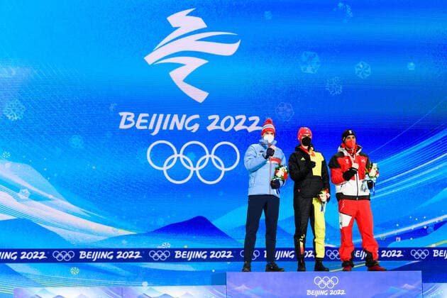220210 Jorgen Graabak of Norway, Vinzenz Geiger of Germany and Lukas Greiderer of Austria celebrates with medals at the medal ceremony for men?s nordic combined individual during day 6 of the 2022 Winter Olympics on February 10, 2022 in Zhangjiakou. Photo: Vegard Grott BILDBYRAN kod VG VG0235 skidor nordic combined nordisk komination Olympic Games, Olympische Spiele, Olympia, OS olympics winter olympics os ol olympiska spel vinter-os olympiske leker peking peking 2022 beijing 2022 beijing 2022 olympic games beijing 2022 winter olympic games peking-os beijing-ol vinter-ol bbeng medaljeseremoni medaljceremoni medal ceremony norge norway celebration jubel silver Copyright: VEGARDxGRoTT BB220210VG064