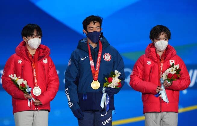China Olympics 2022 Medal Ceremony 8110400 10.02.2022 Silver medalist Japan s Yuma Kagiyama, gold medalist Nathan Chen of the United States, and bronze medalist Japan s Shoma Uno pose on the podium during the medal ceremony for the men s Figure skating, Eiskunstlauf single event at the Medals Plaza in Beijing, China. Alexander Vilf Sputnik Beijing China  Copyright: xAlexanderxVilfx