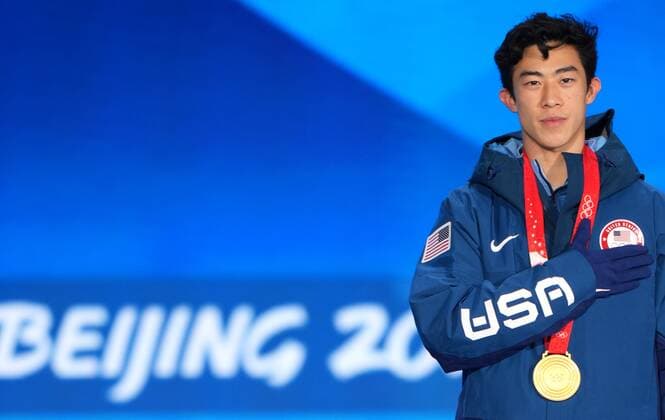 Sport Bilder des Tages China Olympics 2022 Medal Ceremony 8110513 10.02.2022 Gold medalist Nathan Chen, of the United States, poses on the podium during the medal ceremony for the men s Figure skating, Eiskunstlauf single event at the Medals Plaza in Beijing, China. Alexander Vilf Sputnik Beijing China  Copyright: xAlexanderxVilfx