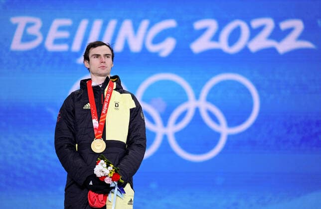 (220210) -- ZHANGJIAKOU, Feb. 10, 2022 -- Gold medalist Vinzenz Geiger of Germany reacts during the awarding ceremony of Nordic Combined Individual Gundersen Normal Hill 10km at Zhangjiakou Medals Plaza of the Winter Olympics in Zhangjiakou, north China s Hebei Province, Feb. 10, 2022. ) (BEIJING2022)CHINA- ZHANGJIAKOU-OLYMPIC Winter games, Winterspiele,Spiele, Summer games AWARDING CEREMONY (CN) DaixTianfang 